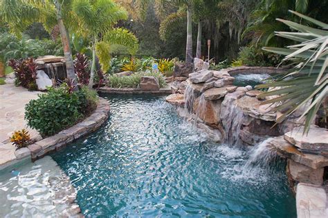 Lagoon Pool With Grotto And Elevated Spa Waterfall By Lucas Lagoons Inc