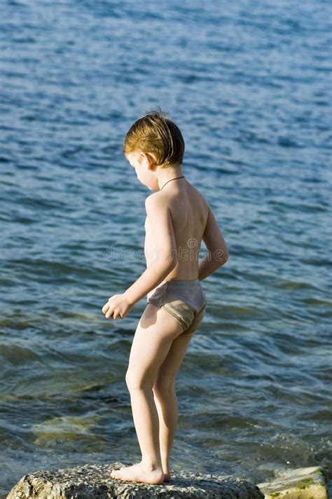 The Boy On The Sea Stock Photo Image Of Grains Play 1392346