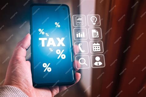 Premium Photo Woman Use Smartphone To Calculate Tax Reduction Tax