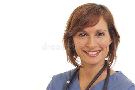 Young Woman Doctor in Scrubs Stock Image - Image of caucasian, pretty ...