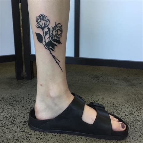 Black Rose Tattoo On The Calf