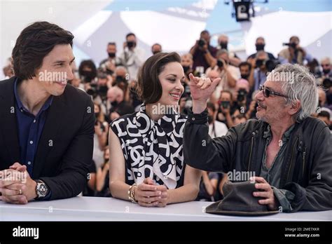 Adam Driver From Left Marion Cotillard And Director Leos Carax Pose