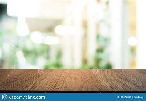 Wood Table Top In Blur Background Room Interior With Empty Copy Space