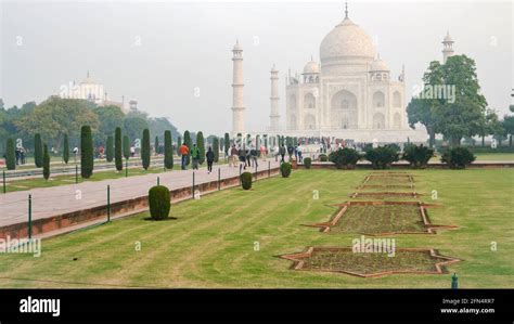 Taj Mahal Ivory White Marble Mausoleum On The South Bank Of Yamuna