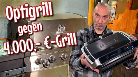 A Man Holding An Open Grill In Front Of A Stove Top Oven With The Words