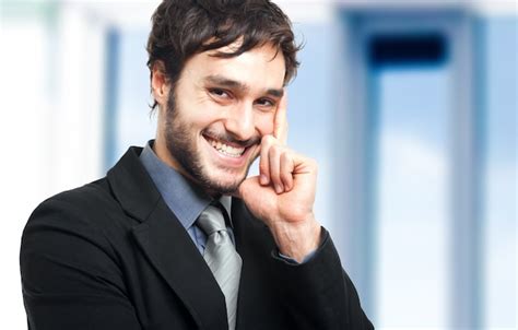 Sonriente Hombre De Negocios En Su Oficina Foto Premium