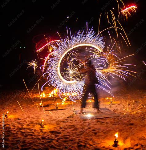 Fire show on the beach at night in Phuket, Thailand Stock Photo | Adobe ...