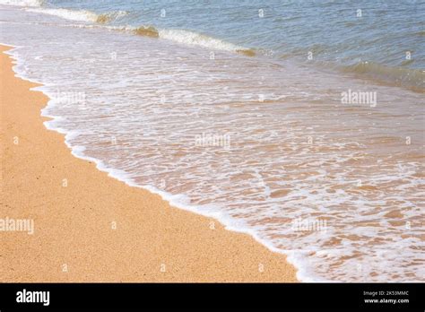 The Coast Of The Sea Of Azov Sea Waves Roll On The Sandy Shore