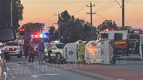 Police Vehicle Rolls Onto Side After Crash In Perths South