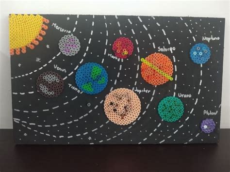 An Art Project Made Out Of Perler Beads With Pictures Of The Solar