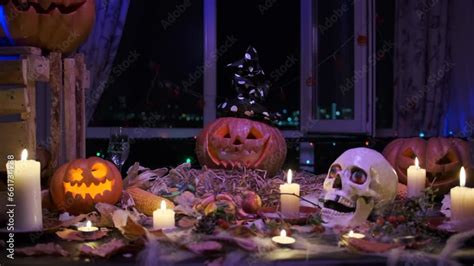 Jack O Lantern On Threshold With Festive Decorations Of Dry Autumn