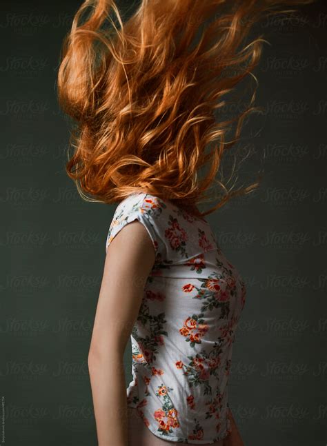 Red Hair In Motion On Dark Green Background By Stocksy Contributor Sonja Lekovic Stocksy