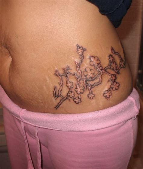 Female Stomach Tattoos To Cover Stretch Marks