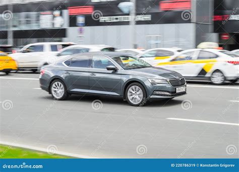 Gray Skoda Superb B8 Side View Photography Of A Modern Premium Sedan Driving In Moscow Streets