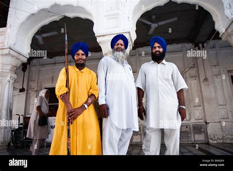 Sikh Guards Guarding The Golden Temple Amritsar Punjab India Stock