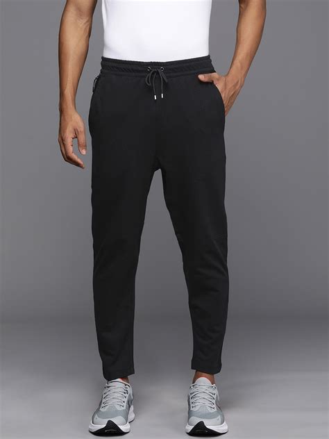 Buy Nike Men Black Solid Standard Fit Pure Cotton Track Pants Track