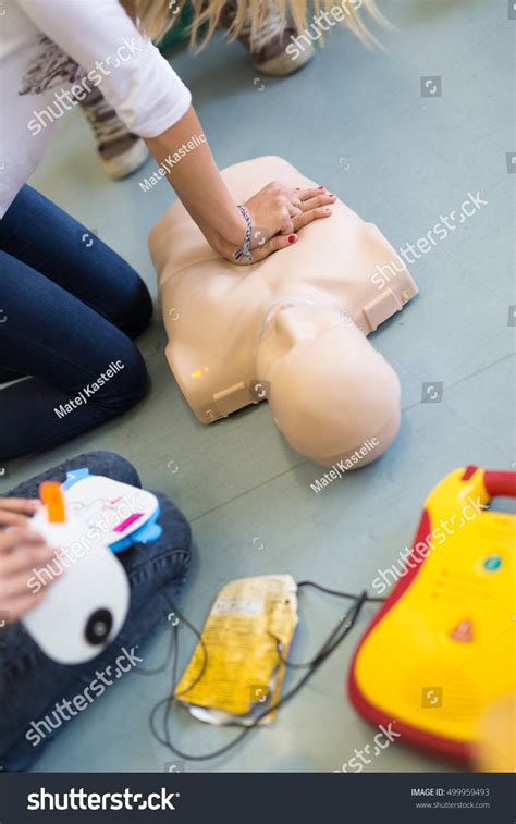 First Aid Cardiopulmonary Resuscitation Course Using Stock Photo Edit