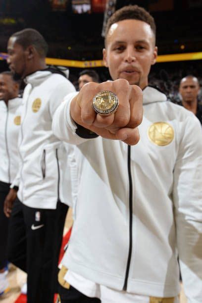 Stephen Curry Of The Golden State Warriors Poses For A Photo With His Championship Ring Before