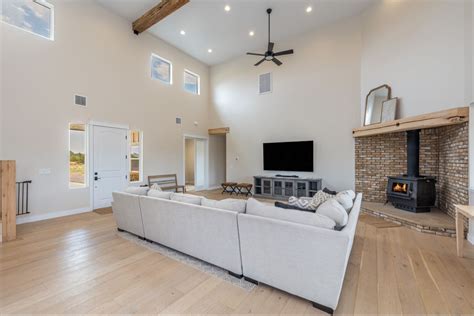 20 ft Ceiling Living Room with Modern Farmhouse Vibes