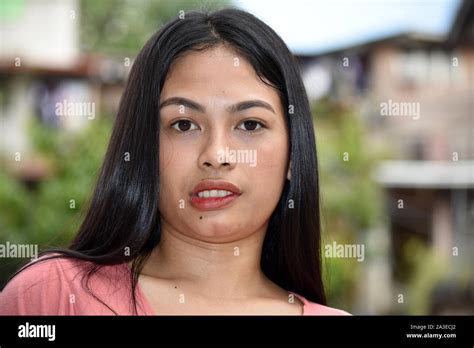 A Smirking Attractive Filipina Female Stock Photo Alamy