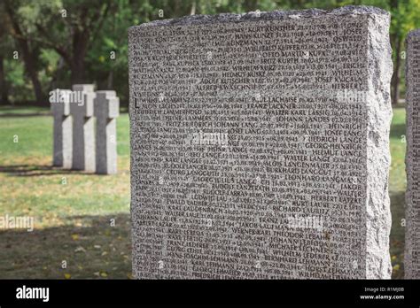 close up view of memorial tombstone with lettering at graveyard Stock ...