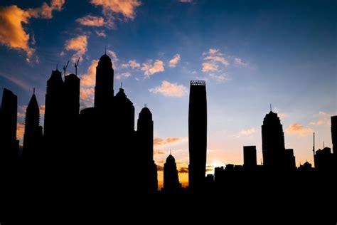 Premium Photo | Dubai marina cityscape silhouette on sunset