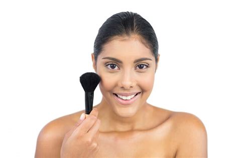 Premium Photo Smiling Nude Brunette Holding Powder Brush