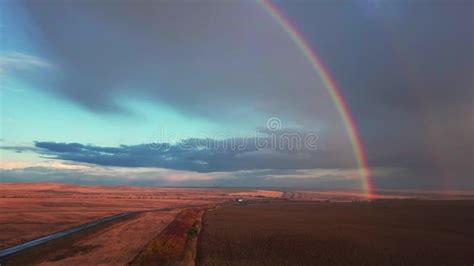 Russia Aerial View Of Rainbow Over Field Highway And Desert