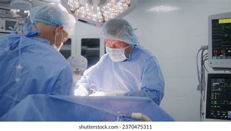 Professional Mature Surgeon Surgical Suit Operates Stock Photo Shutterstock