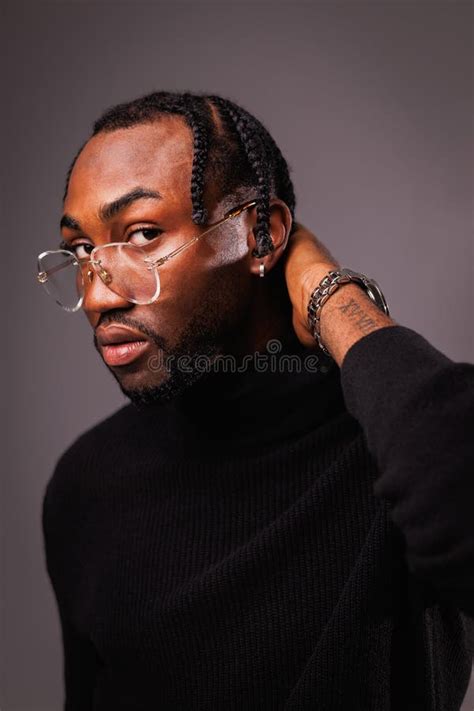 Portrait Of Stylish African American Man In Eyeglasses And Turtleneck