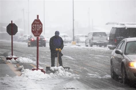 Powerful Storm Brings Blizzard Tornadoes To Us Midwest