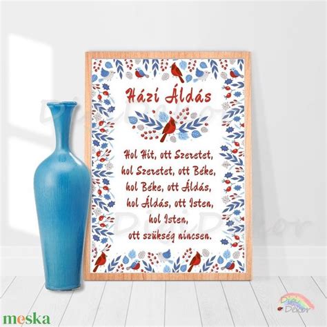 A Blue Vase Sitting Next To A Wooden Frame With A Poem Written In