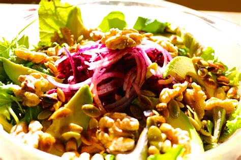 Spicy Tahini Omega Dressing On Local Vegetable Ensemble Naked Cuisine