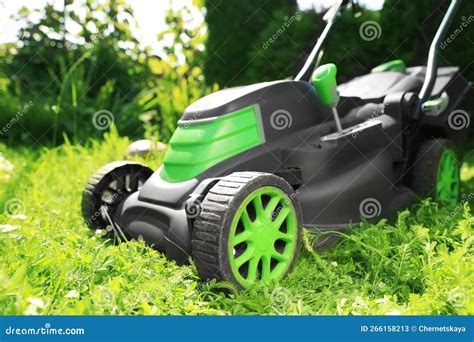 Lawn Mower On Green Grass In Garden Stock Image Image Of Grass Field