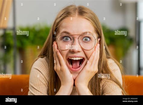 Oh My God Wow Excited Blonde Young Woman Surprised Looking At Camera