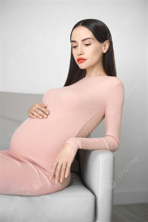 Stylish Photo Of Elegant Pregnant Brunette Woman In Beige Dress