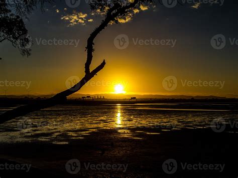 Sunset over the beach. Point Chevalier Beach, Auckland, New Zealand ...