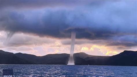 Fisherman Captures Dramatic Video Of Dual Waterspouts Spinning Off