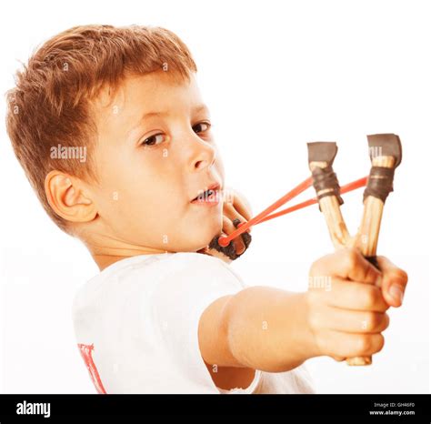 Little Cute Angry Real Boy With Slingshot Isolated Stock Photo Alamy