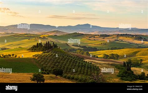 Sunrise in Val d'Orcia Stock Photo - Alamy