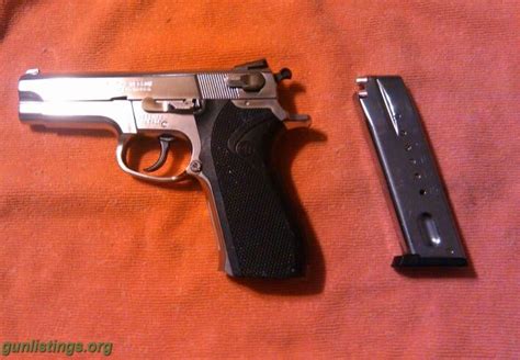 Gunlistings.org - Pistols Smith And Wesson 5906 With Leather Blackhawk Holster