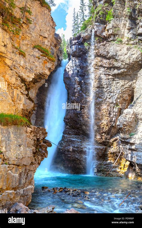 Upper Falls At Johnston Canyon In Banff National Park Flowing Into The