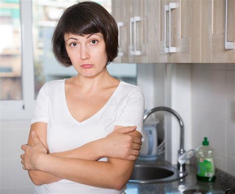 Portrait Of Upset Brunette Woman Stock Photo Image Of Care Dish