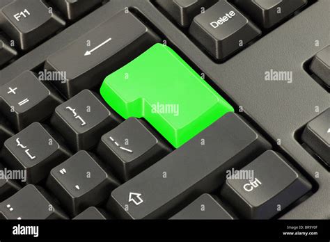 Keyboard With Highlighted Green Button Stock Photo Alamy