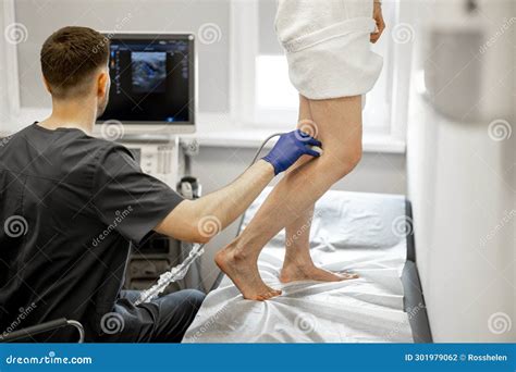 Ultrasound Specialist Scans Veins on a Woman& X27;s Leg Stock Photo ...