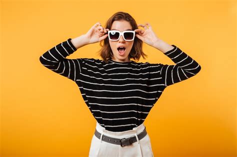 Free Photo Portrait Of A Joyful Girl In Sunglasses Posing