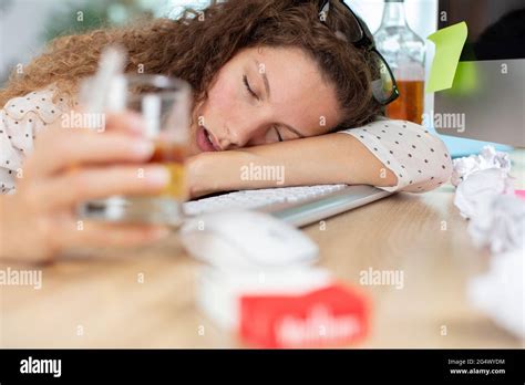 Slumped over desk hi-res stock photography and images - Alamy