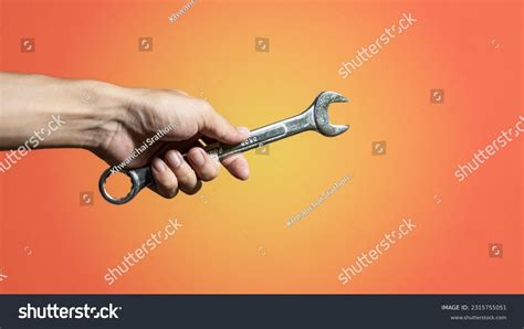 2114 Hand Holding Wrench And Gear Images Stock Photos And Vectors