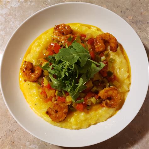 Cheesy Parmesan Polenta With Vegetable Medley Spicy Shrimp And Topped With Arugula Dining And