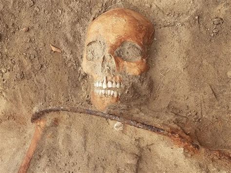 A 17th Century Vampire Buried With A Sickle Across Its Neck To Prevent It From Rising R